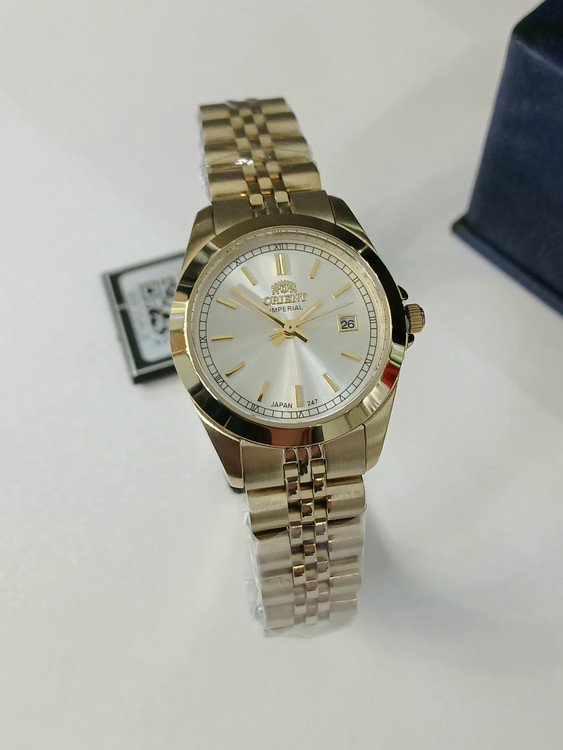 ساعت زنونه طلایی